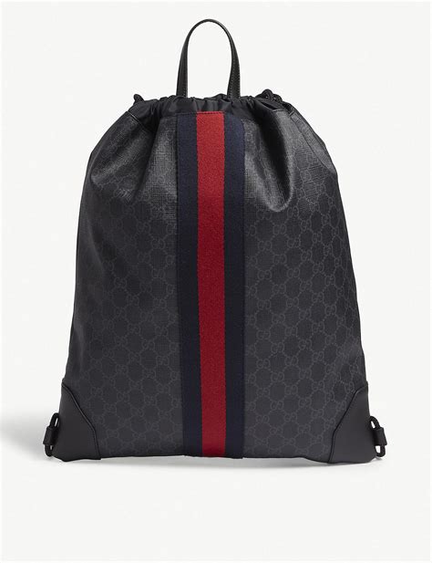 gucci draw string bag.